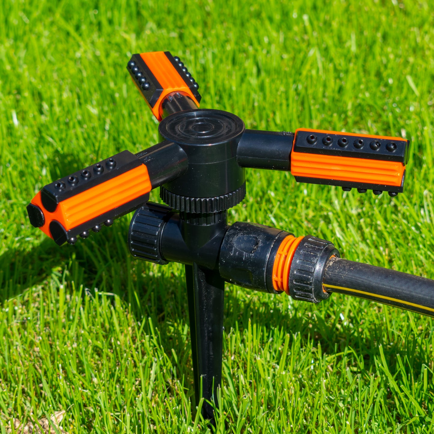 Rotary Lawn Sprinkler on Spike with Adjustable Arms (Black/Orange)