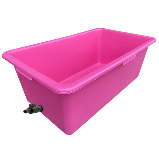 Pink rectangular dog bath with black/orange drain valve at the lower side.