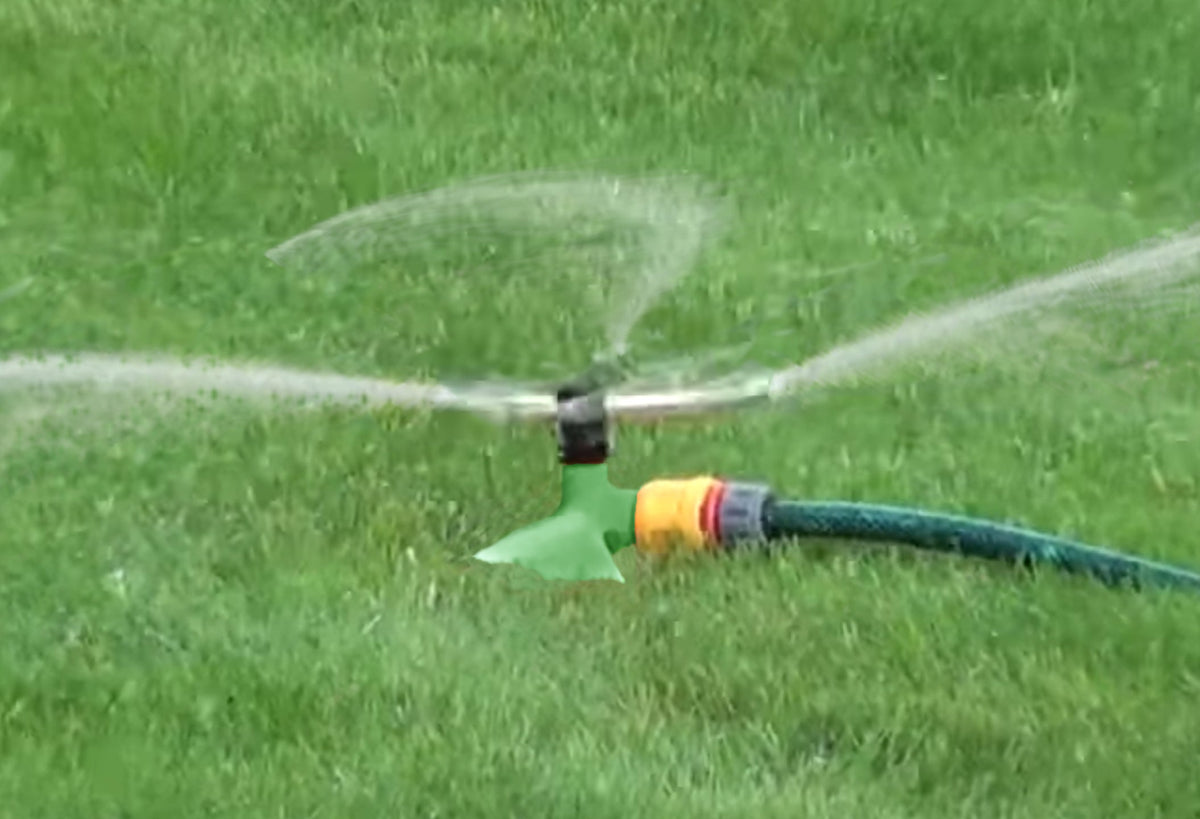 3-Arm Rotating Sprinkler – Brass Arms & Green Leaf Base