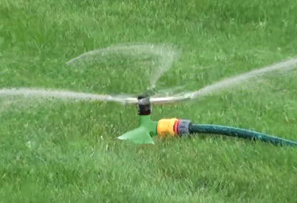 3-Arm Rotating Sprinkler – Brass Arms & Green Leaf Base